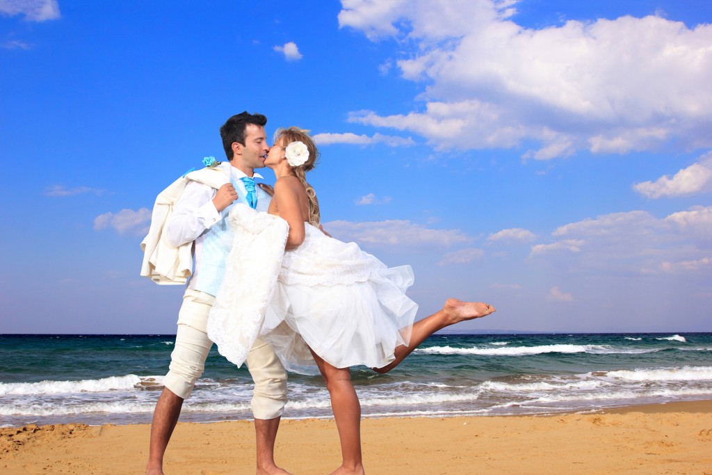 Wedding on the beach, young married couple on the beach